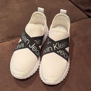 Calvin Klein Cream Slip-On Sneakers with Black Straps